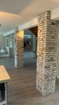 English brick pillars with varied brick depth for light texture and subtle ledges